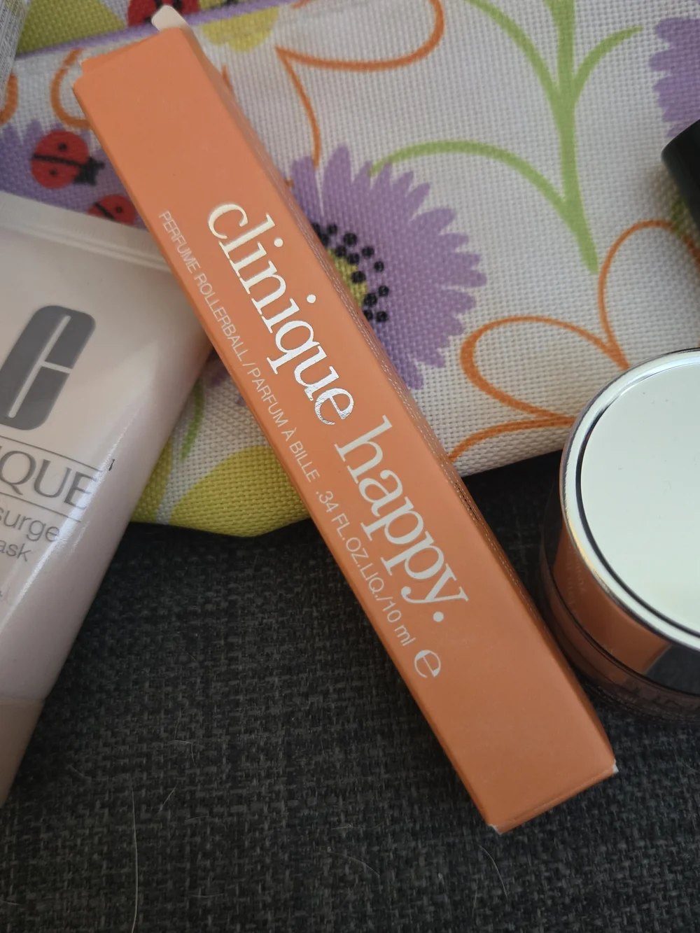 8 Piece Clinique Collection with 2 Purple Floral Pouches, Skincare, Makeup, Etc.